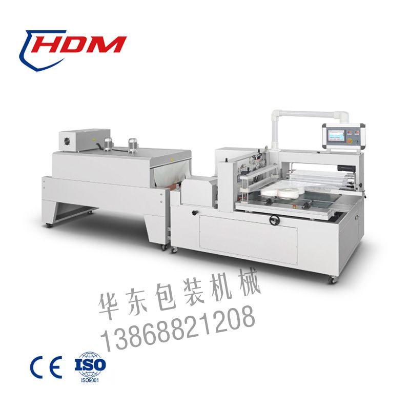 GB-600  全自動(dòng)滾邊封切熱收縮包裝機(jī)(全封閉式)